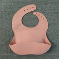 Silicone baby bib with food catcher pocket, pink