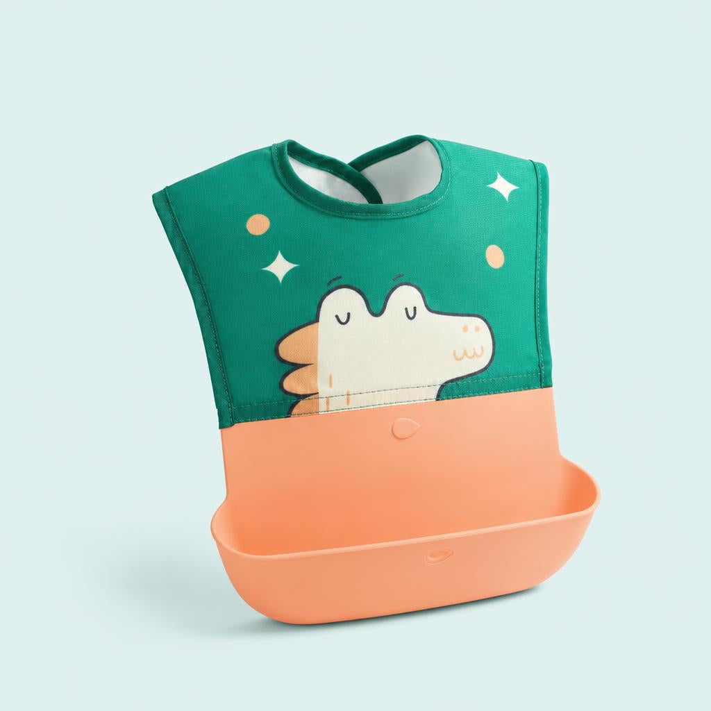 Babero impermeable con bolsillo recogemigas